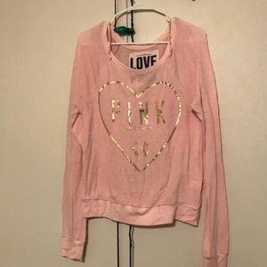 pink sweater with gold metallic letters